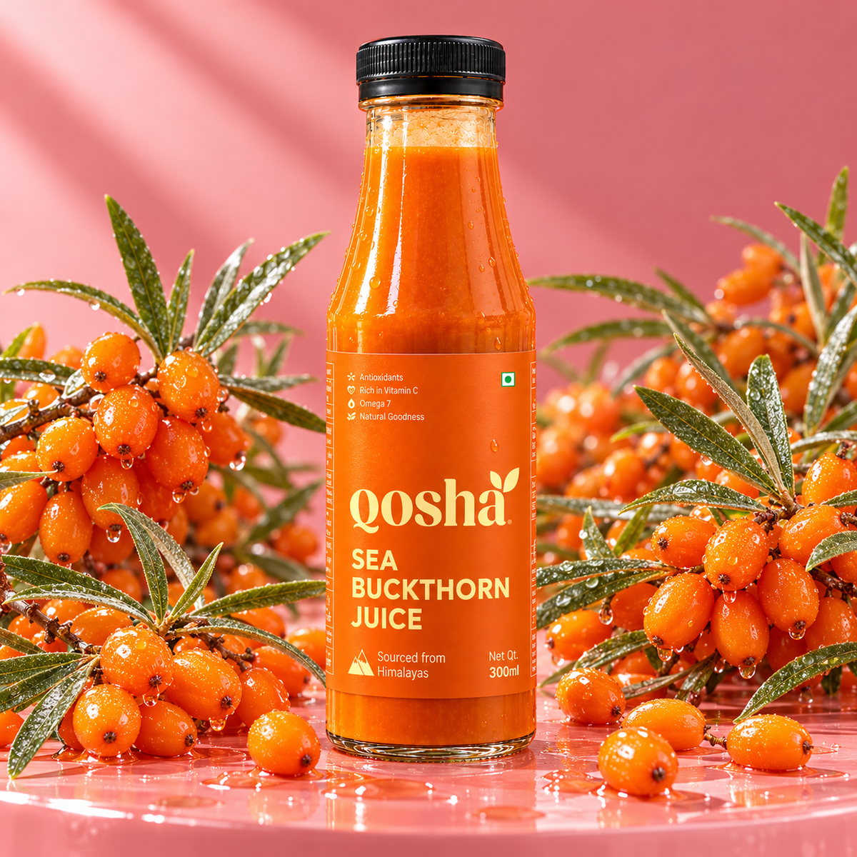 Qosha Sea Buckthorn Juice 300 ml bottle surrounded by fresh sea buckthorn berries